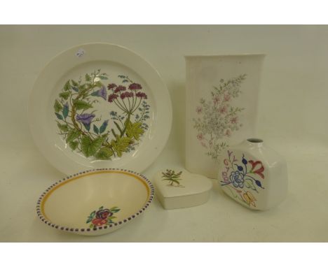 An assortment of Poole Pottery items including a vase, 9" high.