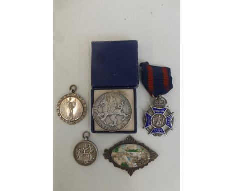 Four assorted silver medals including a Rifle Society enamel (unmarked) and a Somerset Count Rifle Association 1956 2nd S.R.(