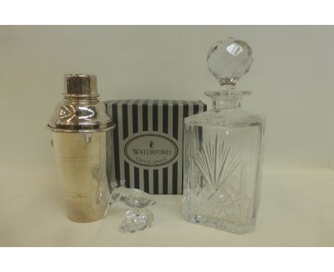 A Waterford Crystal kingfisher, an Edinburgh Crystal decanter and an Arthur Price cocktail shaker.