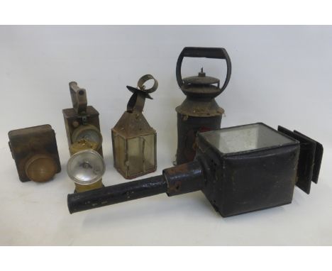 A box of assorted carbine, battery and candle lanterns including a NIFE Batteries Redditch England type NH10-A hand held lamp