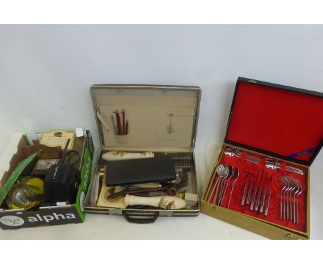 An assortment of mixed collectables including a part canteen of cutlery, a camera, die-cast models etc.