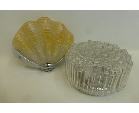 A 1930s Art Deco glass and chrome wall light in the form of a clam seashell, plus a clear glass ceiling light.