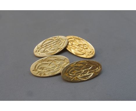 A pair of 18ct gold cufflinks in a tooled leather box, approximate weight 12.2g.