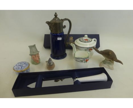 A Royal Copenhagen porcelain figure of a robin, a Wade Falstaff spirit jug, and other items including a Royal Worcester boxed