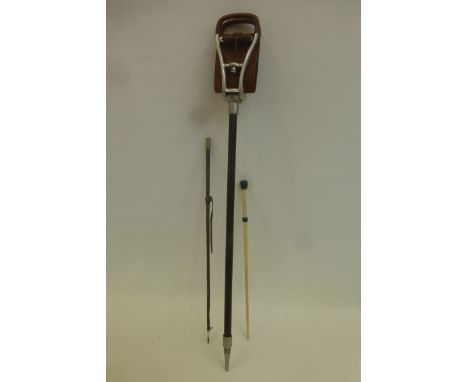 A W.M. Mills Birmingham shooting stick and two riding crops.