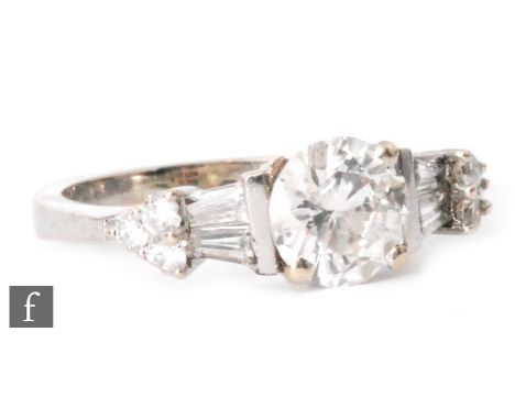 An 18ct white gold diamond ring with central brilliant cut claw set stone weight approximately 1.10ct, colour J/K, clarity I1