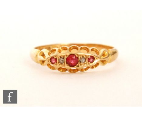 An early 20th Century 18ct hallmarked red spinel and diamond five stone boat shaped ring, Chester 1907, ring size L. 
