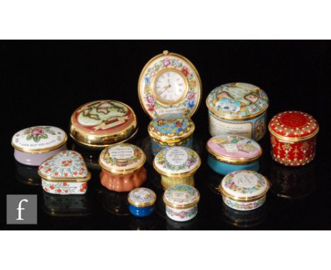 A collection of Halcyon Days enamels, to include an oval clock with a floral design and 'The happier the time the faster it g