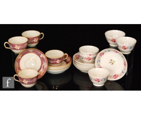 A set of five late 19th Century Staffordshire tea bowls and saucers each decorated with a hand painted floral garland with a 