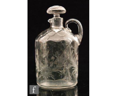 An Edwardian Stevens and Williams clear crystal decanter, skeletal moulded in a scale pattern and intaglio cut with a foliate