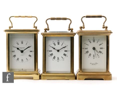 A 20th Century French brass carriage clock by Bernard Freres and two similar carriage clocks (3)