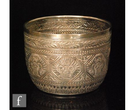 A Victorian hallmarked silver circular sugar basin with Indian style chased decoration to whole, weight 8oz, diameter 12cm, L