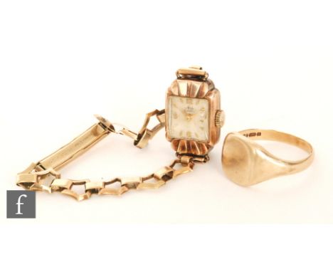 A ladies 9ct hallmarked Avia wrist watch with Arabic numerals and batons to a square dial, all to a 9ct bracelet, with a 9ct 