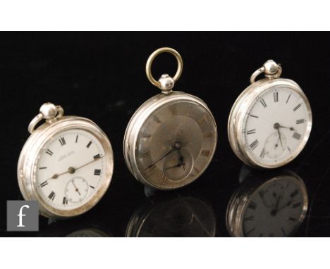 A hallmarked silver key wind open faced pocket watch with silvered engine turned and engraved dial and gilt Roman numerals, L