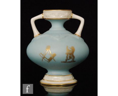 A small early 20th Century Royal Worcester twin handled shape 1089 vase, the whole glazed in a pale matt blue with Masonic sy