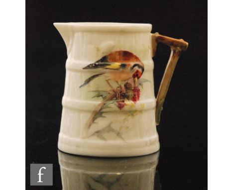 A 1920s Royal Worcester jug formed as a cooper barrel decorated by Powell with a hand painted goldfinch, signed, green mark w