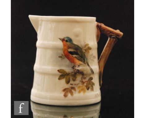 A 1920s Royal Worcester jug formed as a cooper barrel decorated by Powell with a hand painted chaffinch, signed, green mark w