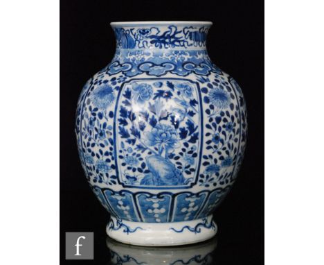 A Chinese blue and white vase, Kangxi (1662-1722) four-character mark to base, of rounded ovoid form rising to a flared rim, 