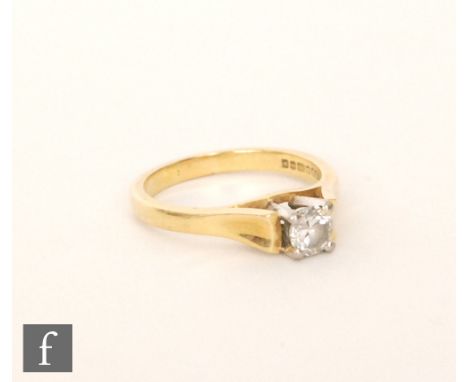 A ladies 18ct hallmarked diamond solitaire ring, claw set brilliant cut stone, weight approximately 0.33ct, to raised shoulde