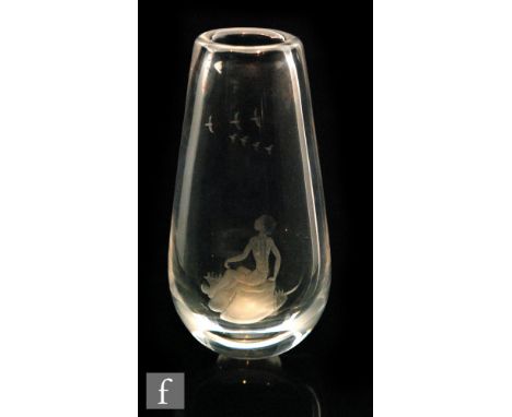 A post war Orrefors crystal glass vase designed by Sven Palmqvist of compressed ovoid form with an engraved decoration depict