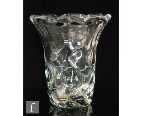 A later 20th Century French clear crystal glass vase by Daum of heavy form rising to a flared rim, height 30cm.