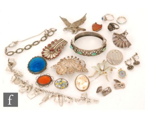 A parcel lot of assorted silver and white metal jewellery to include marcasite set brooch, earring, bracelet and bangle, char