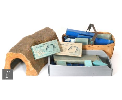 A collection of OO gauge Hornby Dublo items, mostly pre-nationalisation, including three coaches, ten assorted items of rolli