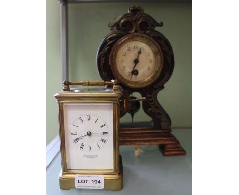 An Art Nouveau design probable German mantel timepiece together with a brass carriage clock, the enamelled dial inscribed Ham