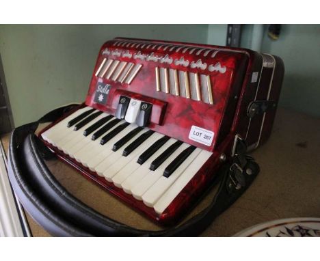 ' Stella ' half size accordion, pearl red finish.