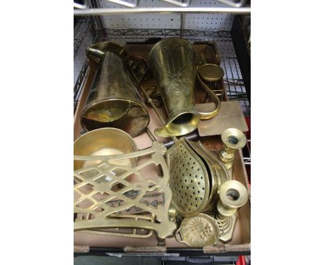 A box containing a selection of brass wares includes a set of postal scales