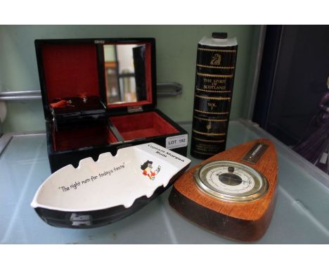 A ceramic whisky flagon in the form of a book, together with a Wade Captain Morgan ashtray, a lacquer jewellery box, and a Ge