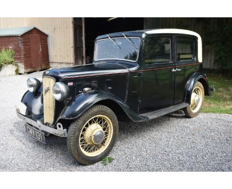 A 1935 Austin 10/4 Lichfield saloon, registration number CMV 131, chassis number G72498, engine number IG23457, cream over bl