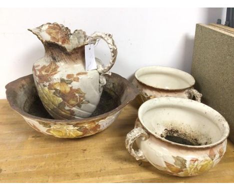A late Victorian toilet set with two chamber pots (13cm x 23cm), water jug and basin (4)
