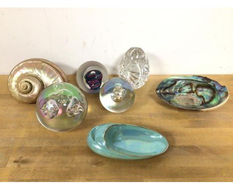 A mixed lot including a Caithness glass paperweight, marked Isadora, a New Zealand paua shell, a further shell, a Carltonware