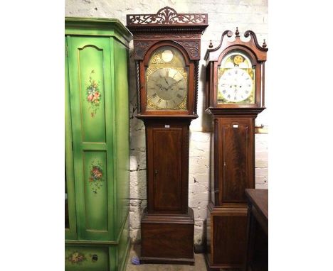 A George III mahogany longcase clock, by J. Stewart, Glasgow, the 14 inch arched brass dial with maker's roundel and dolphin 