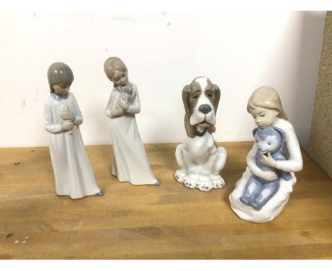Four Nao figures, including figures of Children and Dog (18cm)