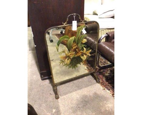 A firescreen with painted mirror, foliate decoration, handle to top (72cm x 50cm)