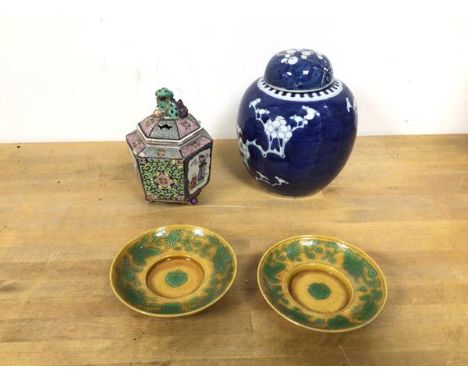 A mixed lot of china including two saucers, with yellow ground and green decoration, a footed jar with pierced lid and fou do