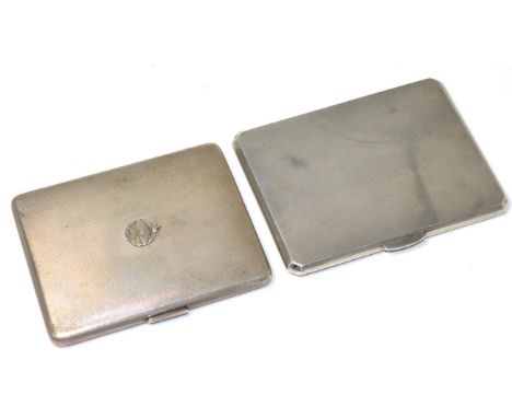 An engine turned silver cigarette case with Royal Tank Corps badge, London 1938; and another engine turned cigarette case, Bi