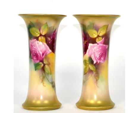 A pair of Royal Worcester vases signed K H Blake, rose flower decorated 