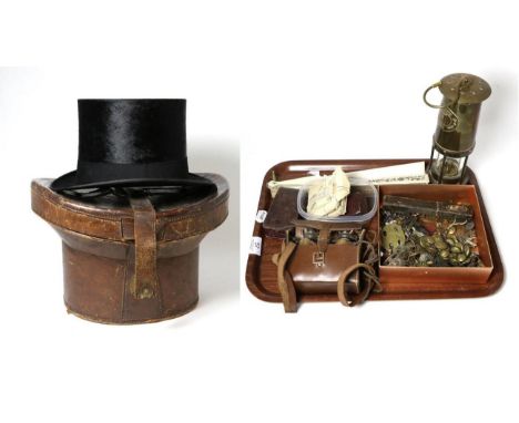 A quantity of collectors items including military jacket buttons, cap badges, shaving razor, two World War I service medals, 
