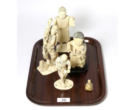 A group of four Meiji Period Japanese ivory okimonos; and a netsuke of similar date 