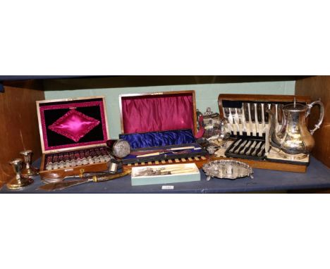 A quantity of silver plated wares including an oak cased twelve place setting dessert service, two cased sets of fish eaters,