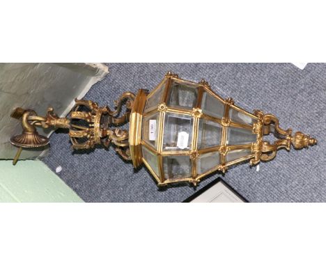A gilt metal and glass pendant light fitting