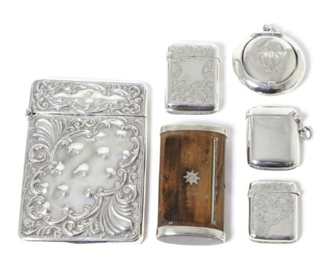 A group of silver items comprising: a repousse decorated card case; three various vesta cases; a circular snuff box; and a wh