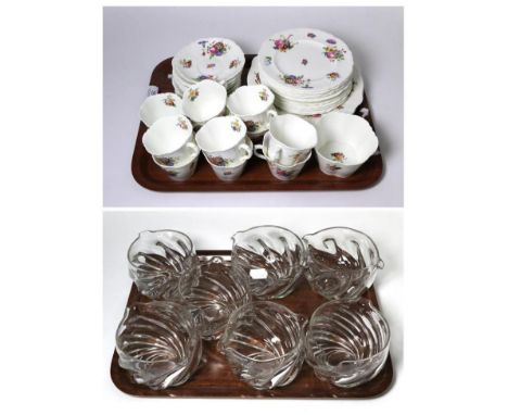 A set of seven Wrythen glass rinsers; and a Cauldon china tea service decorated with floral sprays (on two trays)