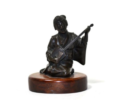 A Japanese bronze figure of a Shamisen player 