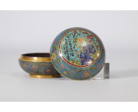 Round cloisonne box decorated with multicoloured flowers on a light blue background with the Qianlong Mark of the 19th centur