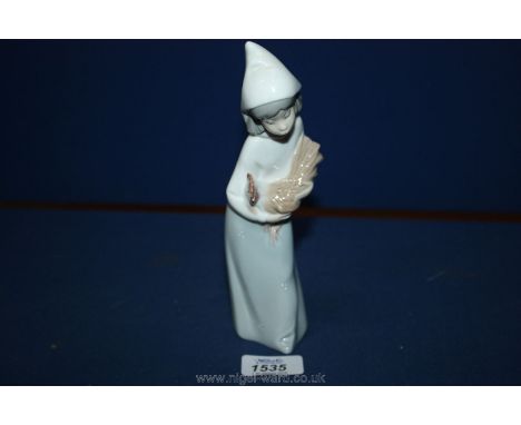 A Lladro figure of a Girl standing with a Cockerell, 8'' tall.