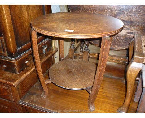 An Art Deco design circular Occasional Table having circular lower shelf/stretcher. 20'' diameter, 18 3/4'' high.